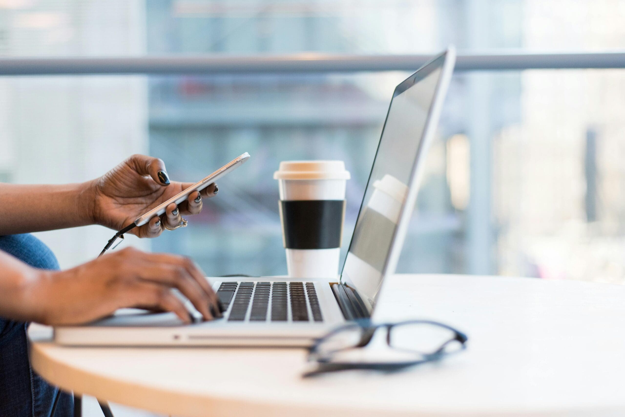 Coffee hand laptop